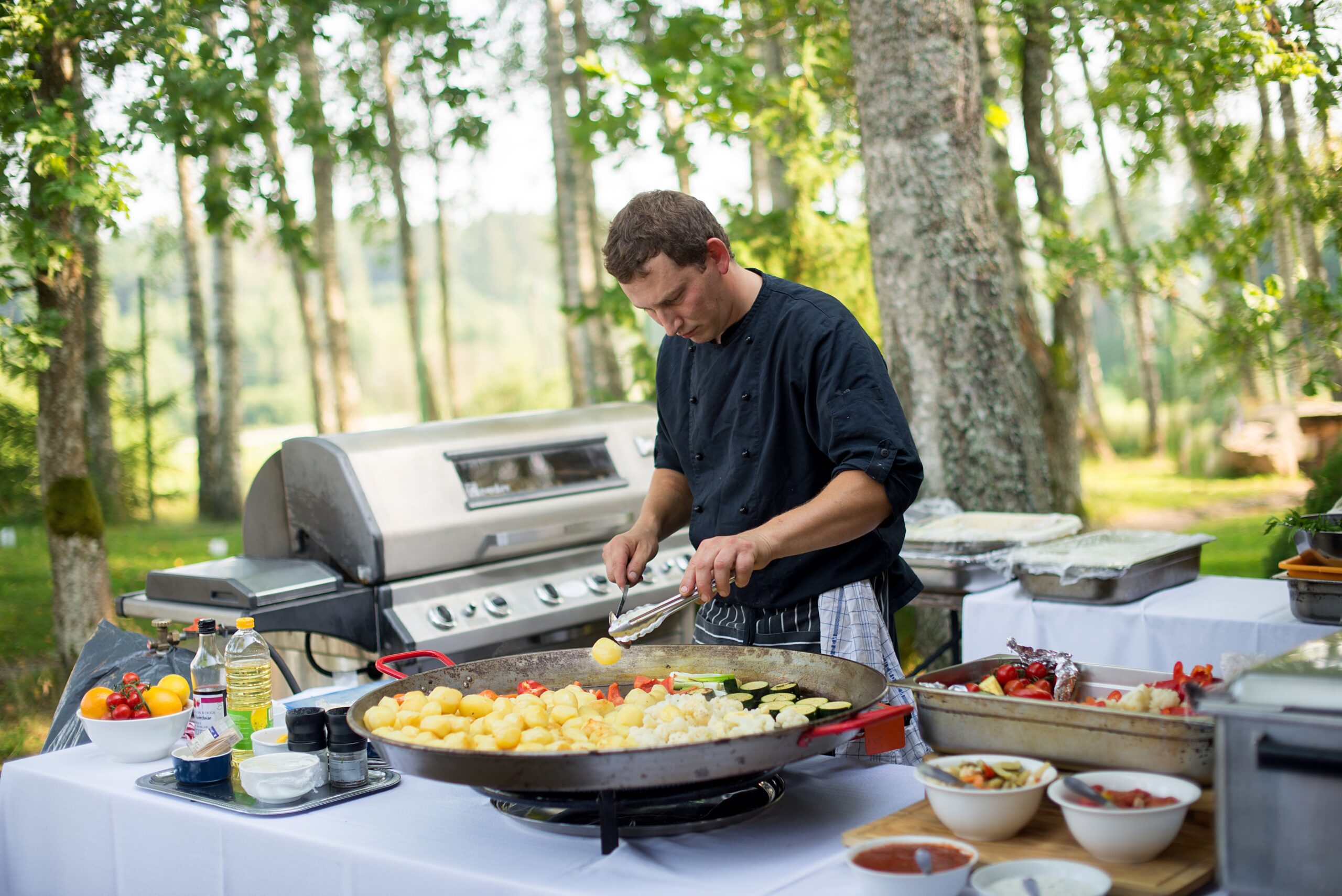 Corporate dinner reception under redwoods with catering